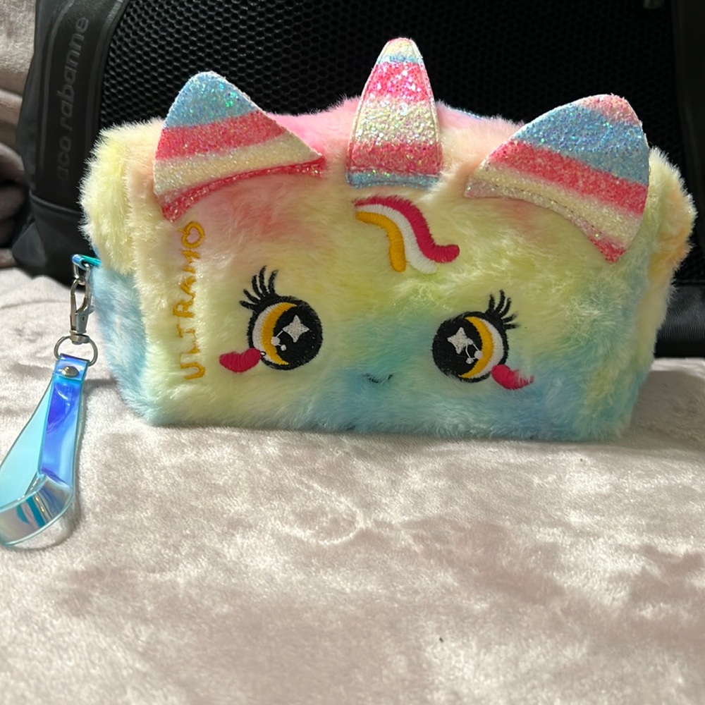 Pencil pouch or as in cosmetic pouch